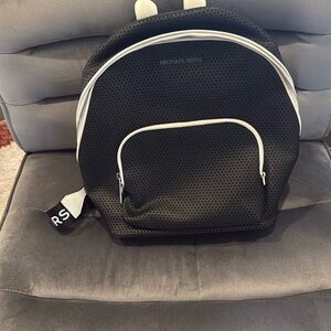 Michael Kors Black and White Perforated Backpack